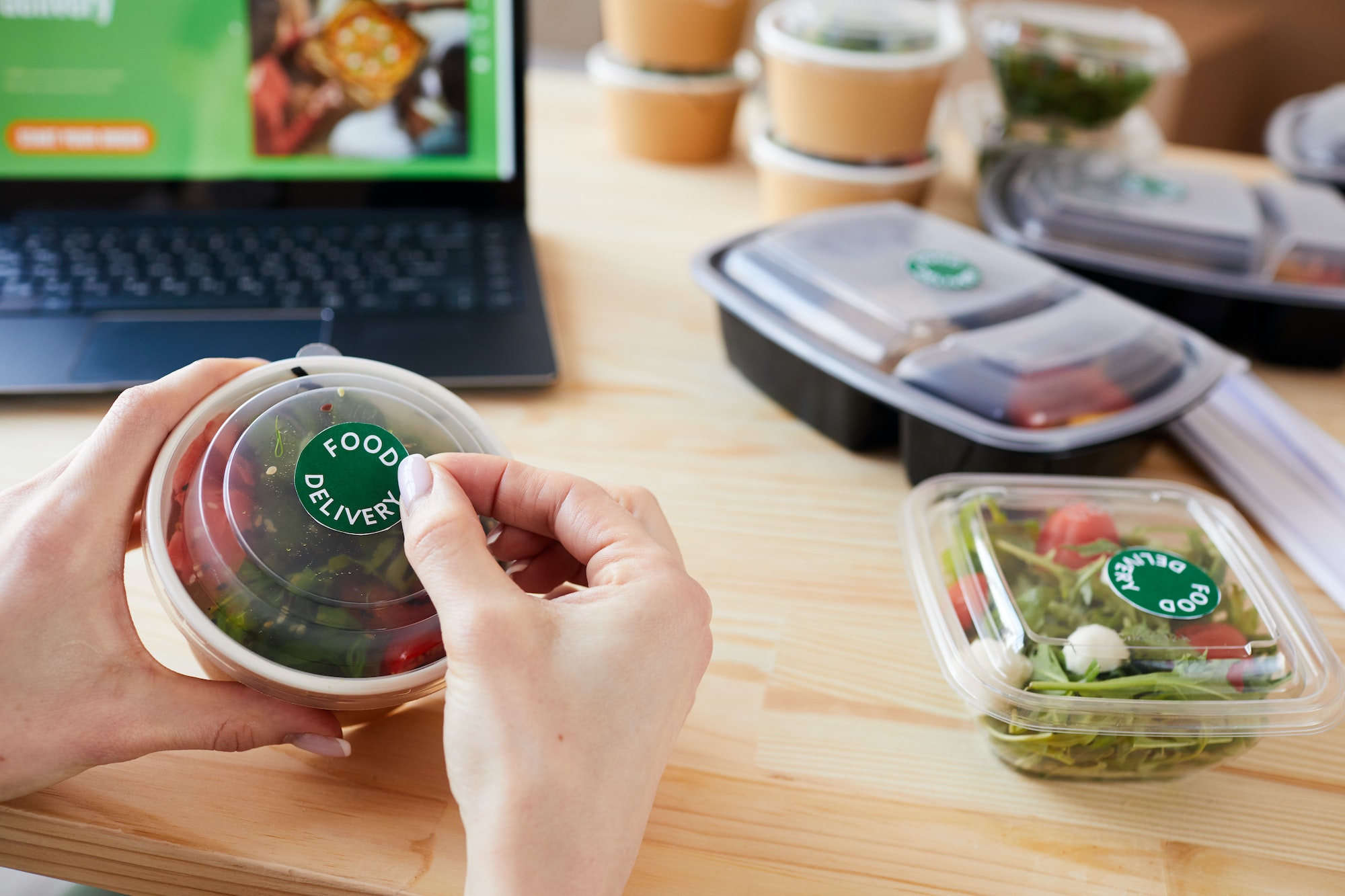 Woman working in takeaway service